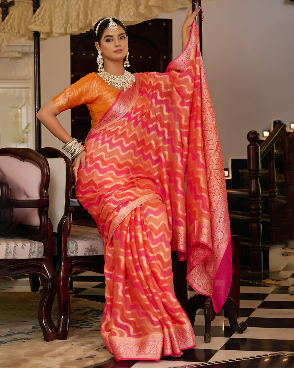 Sunset Flame Pure Chiffon Saree with Handwoven Rangkat Patterns
