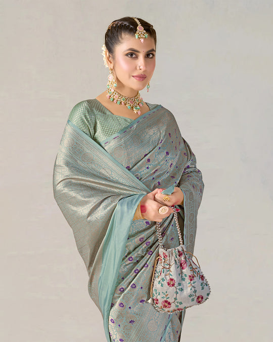Sea Green Pure Katan Saree with Brocade Zari & Contrast Purple Motifs