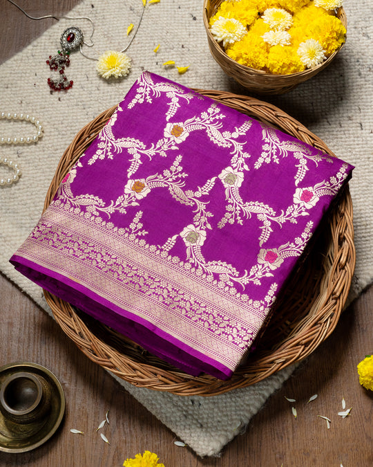 Royal Radiance Purple Katan Silk Saree Beautifully Adorned With Floral Fantasy & Rich Zari