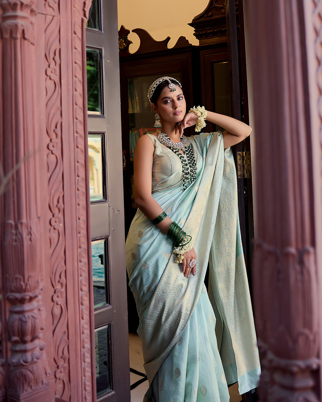 Pastel Aqua Green Pure Banarasi Saree with Delicate Butidar Weaving