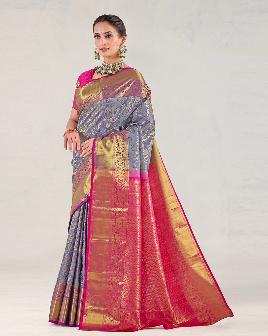 Wild Blue Pure Kanjivaram Saree with Magenta Ornamental Gold Detailing