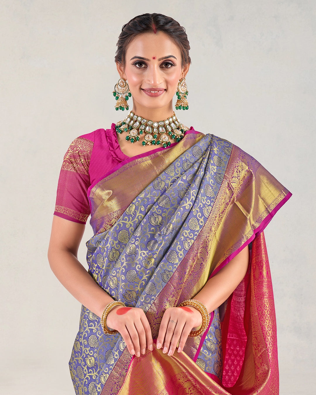 Wild Blue Pure Kanjivaram Saree with Magenta Ornamental Gold Detailing