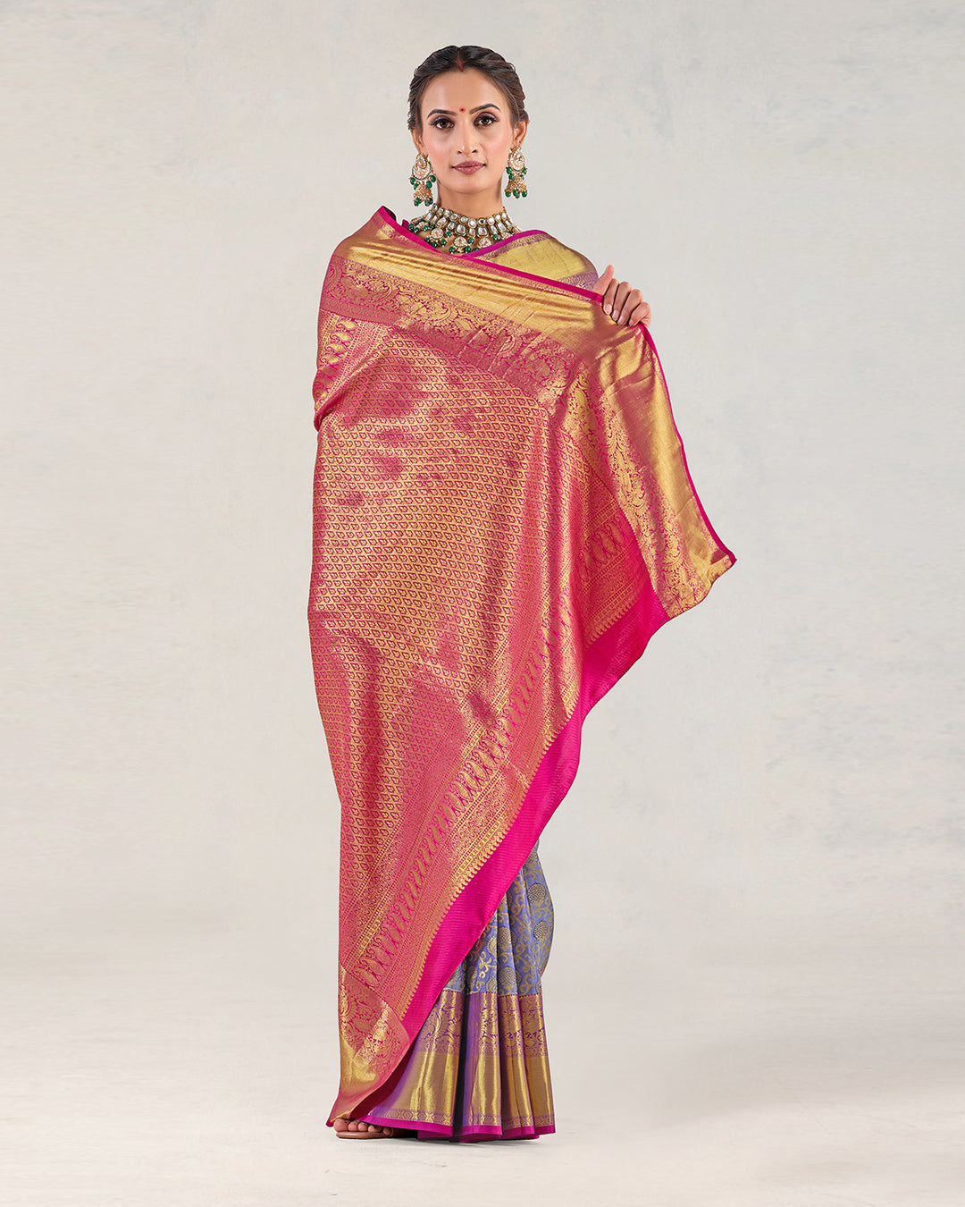 Wild Blue Pure Kanjivaram Saree with Magenta Ornamental Gold Detailing