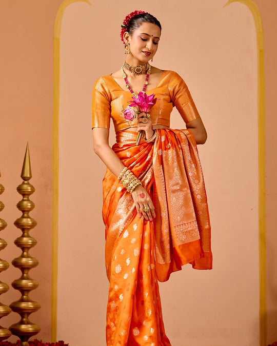 Orange Banarasi Saree with Delicate Floral Butta Weaves