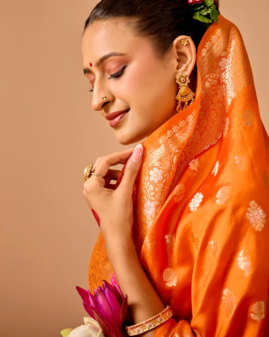 Orange Banarasi Saree with Delicate Floral Butta Weaves