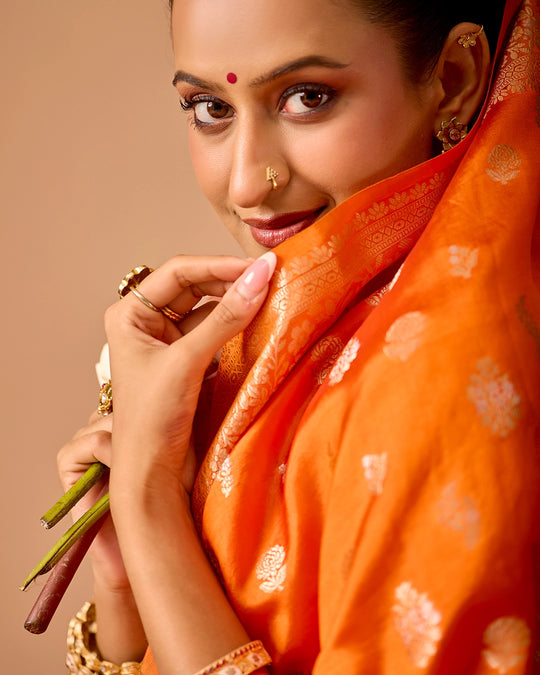Orange Banarasi Saree with Delicate Floral Butta Weaves