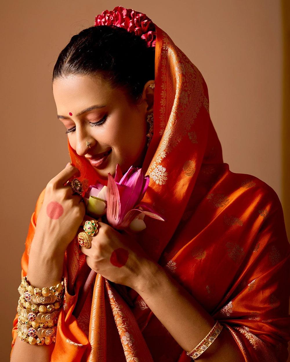 Orange Banarasi Saree with Delicate Floral Butta Weaves
