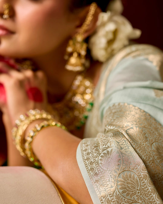 Pastel Green Banarasi Saree with Elegant Butidar Weaves
