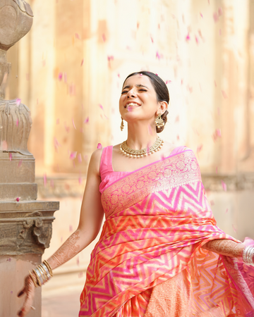 Sadabahaar Pure Chiffon Banarasi Silk Saree in Radiant Sunset Hues with Enchanting Chevron Weaves