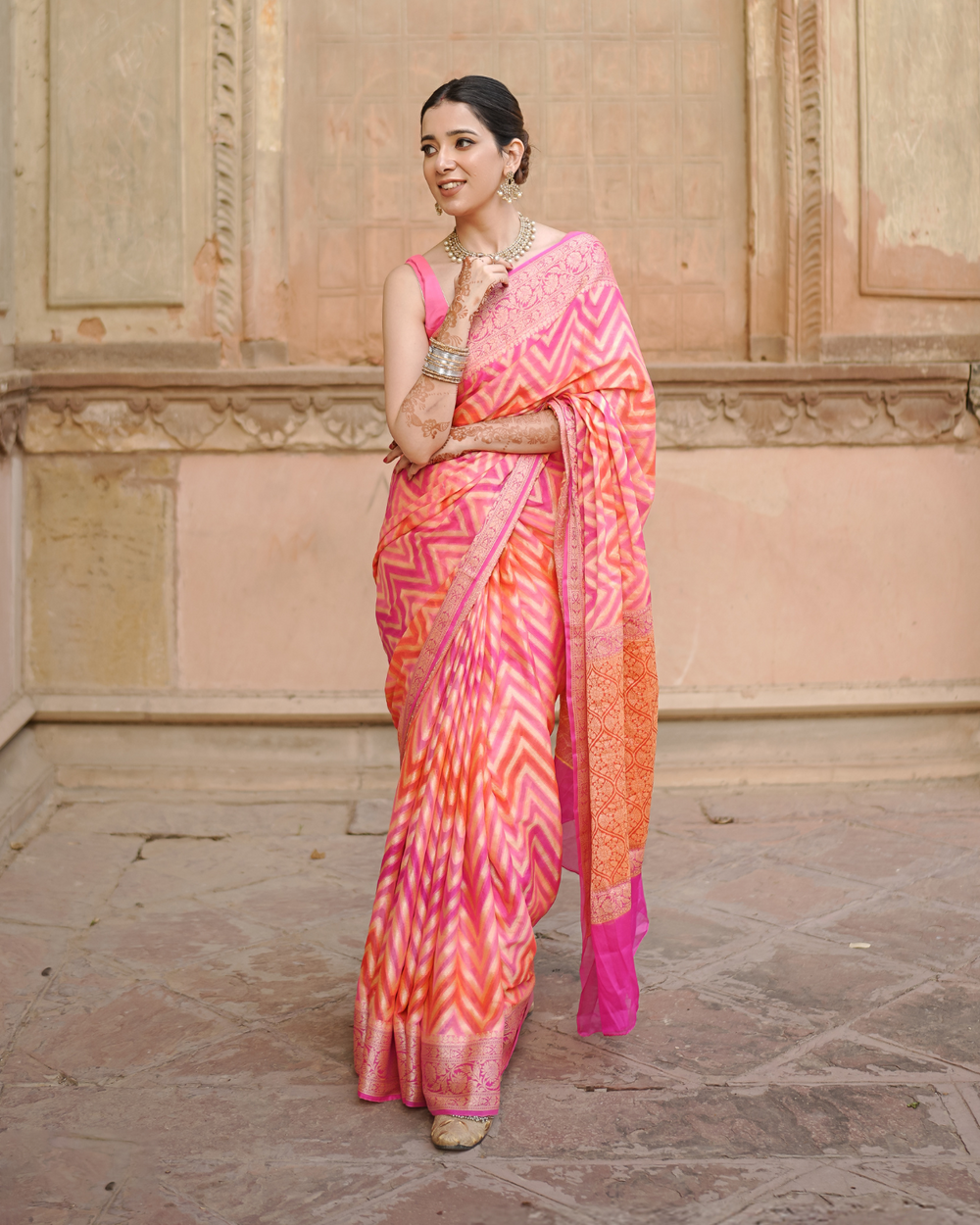 Sadabahaar Pure Chiffon Banarasi Silk Saree in Radiant Sunset Hues with Enchanting Chevron Weaves