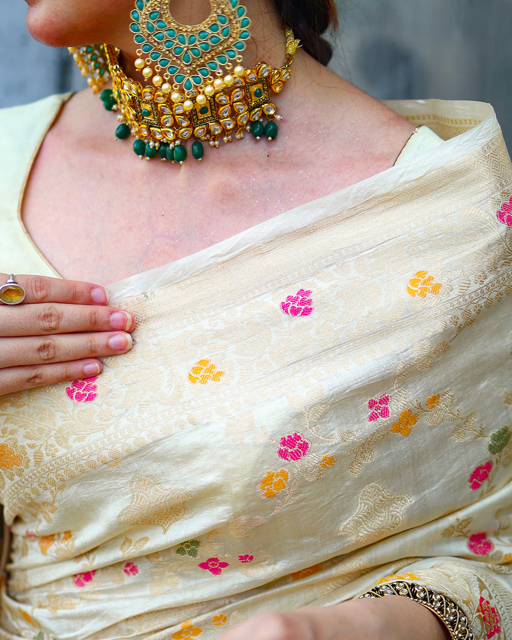 Cream Pure Banarasi Saree Adorned with Meenakari Floral Buttas