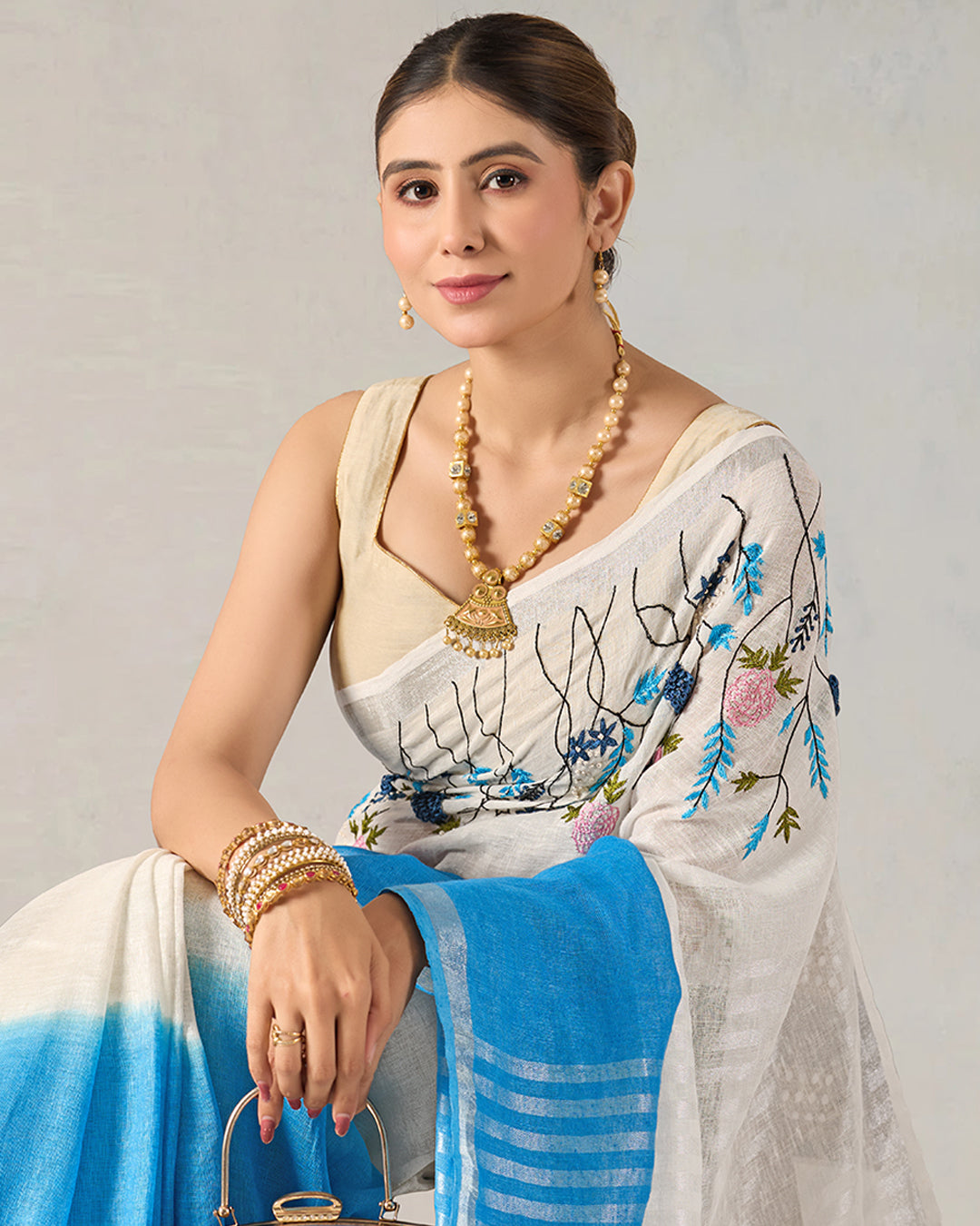 White Tranquil Blue Pure Linen Saree with Floral Blooming Hand Embroidery