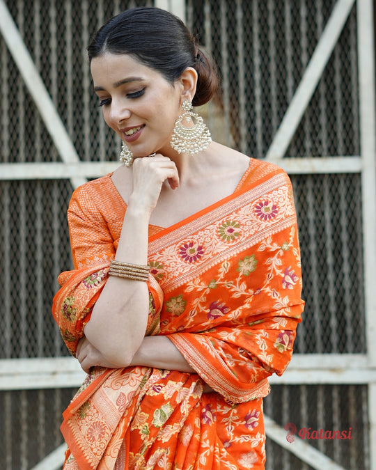 Glorious Orange Sunset Hues Pure Chiffon Saree with Luxurious Floral Weaves Patterns