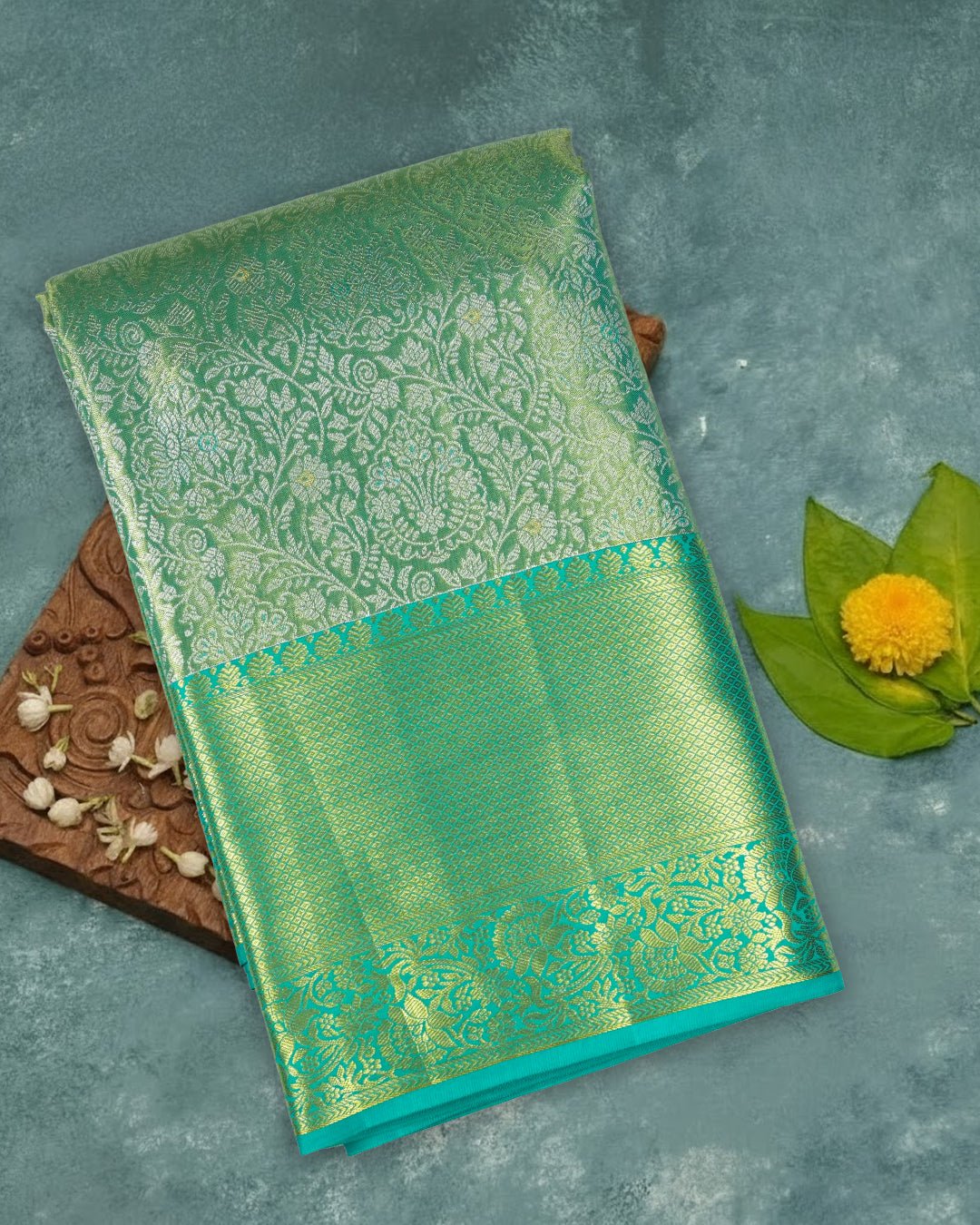 Green Pure Kanjivaram Saree With Teal Accents and Antique Gold Florals - katansi