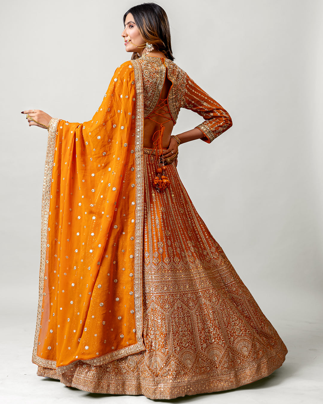 Seraphic Amber Orange Georgette Royal Handloom Embroidered Lehenga