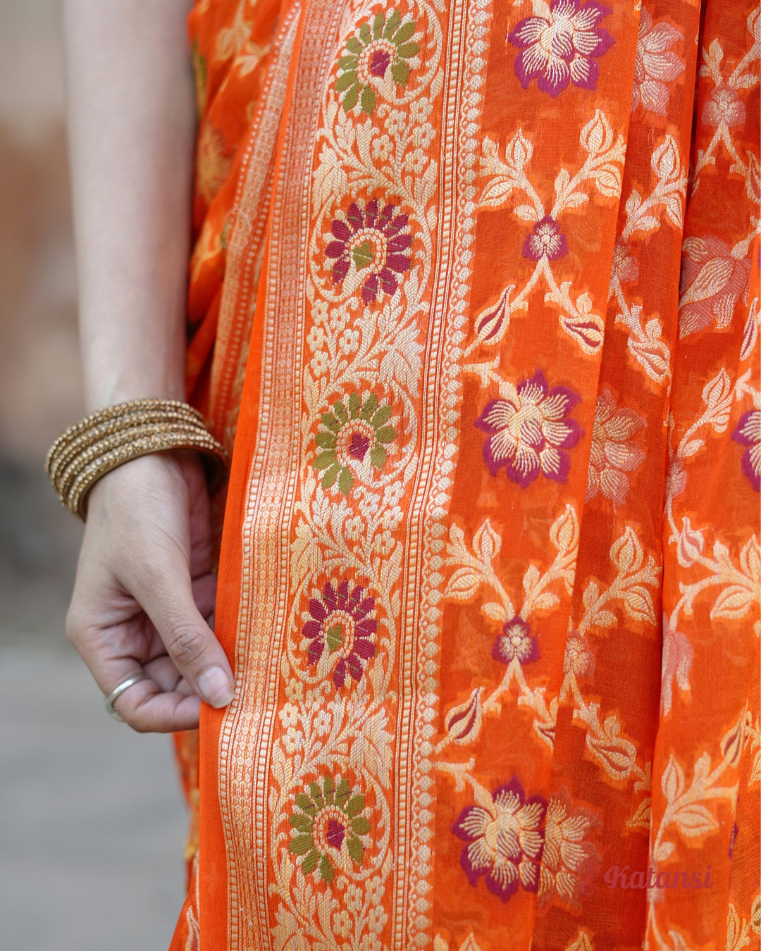 Glorious Orange Sunset Hues Pure Chiffon Saree with Luxurious Floral Weaves Patterns