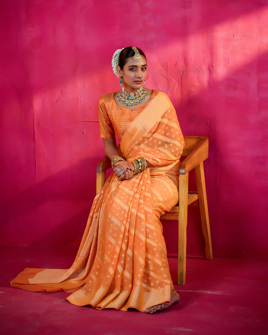 Saffron Pure Chiffon Saree with Mandarin Hues and Heritage Weaving Patterns