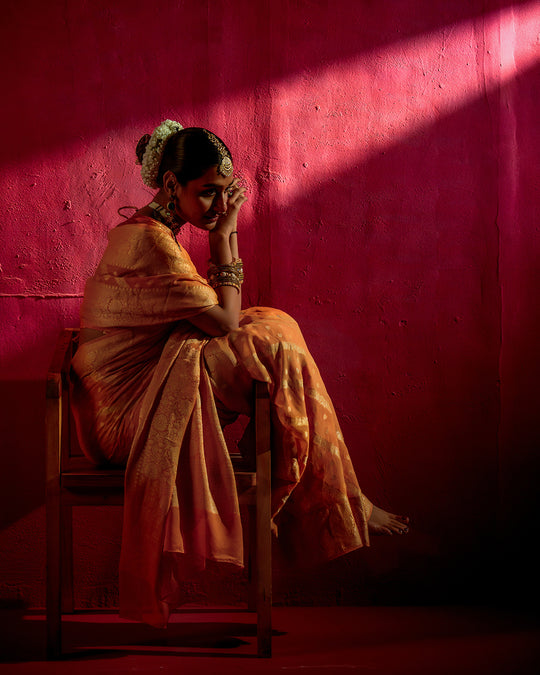 Saffron Pure Chiffon Saree with Mandarin Hues and Heritage Weaving Patterns