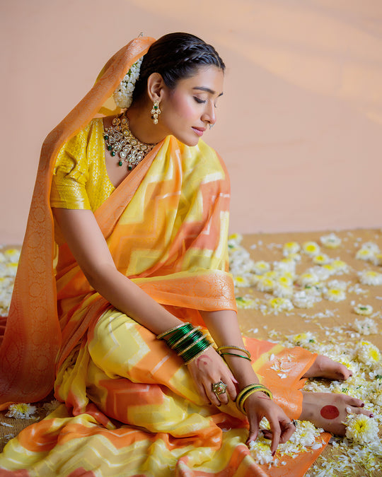 Orange-Yellow Pure Chiffon Saree with Chevron Flame Patterns and Regal Finish