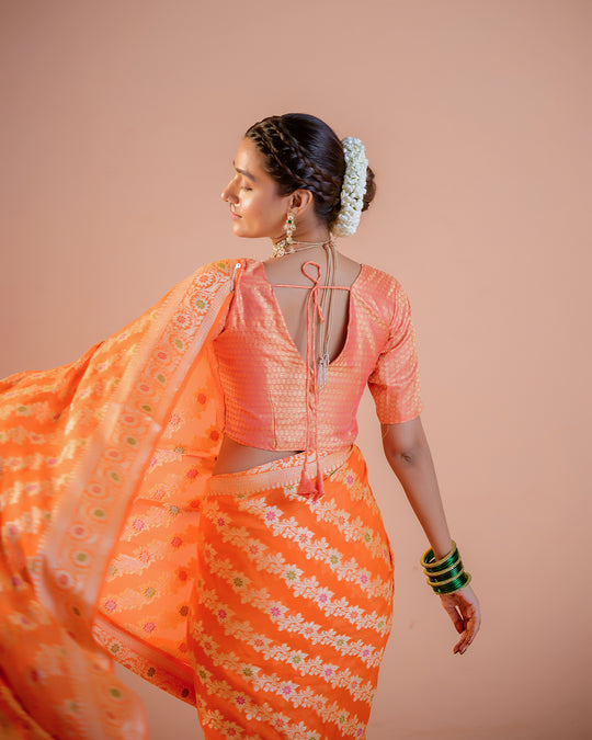 Orange Pure Chiffon Saree with Floral Radiance and Blooming Jaal