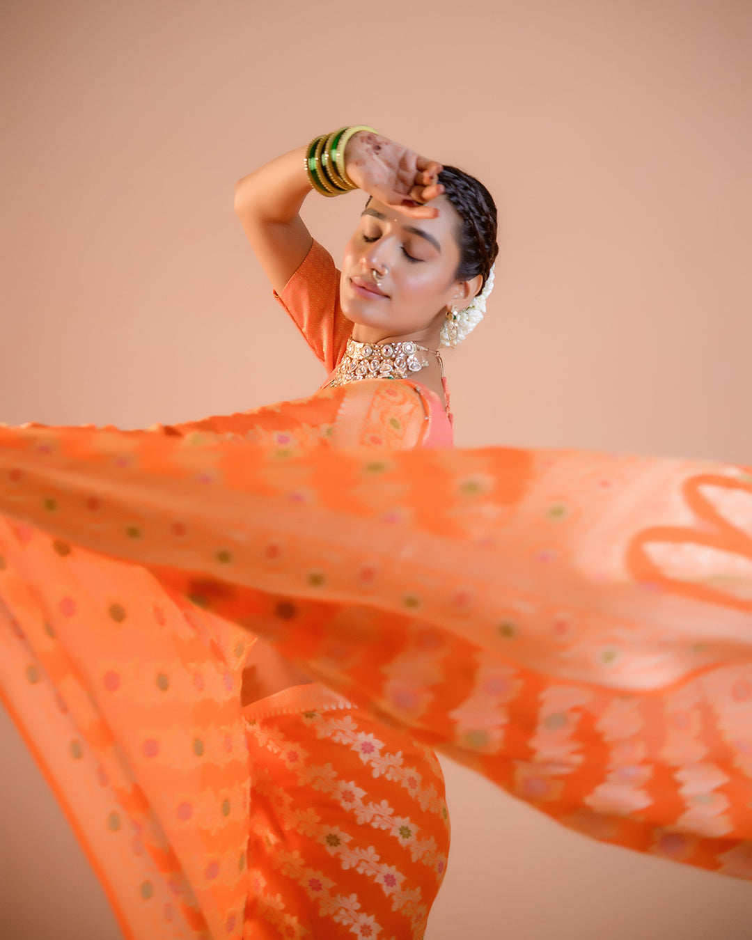 Orange Pure Chiffon Saree with Floral Radiance and Blooming Jaal