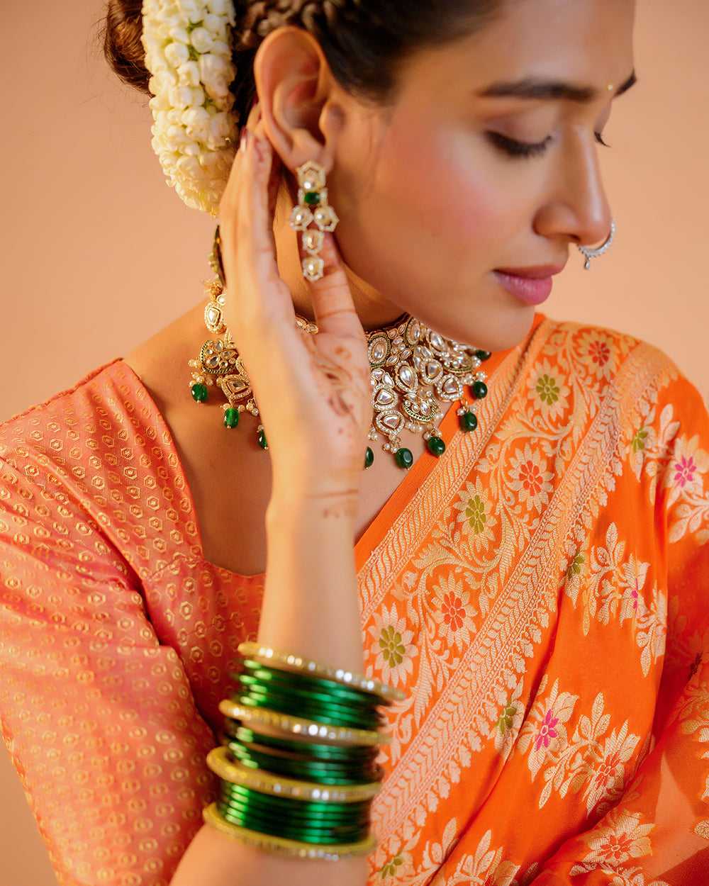 Orange Pure Chiffon Saree with Floral Radiance and Blooming Jaal