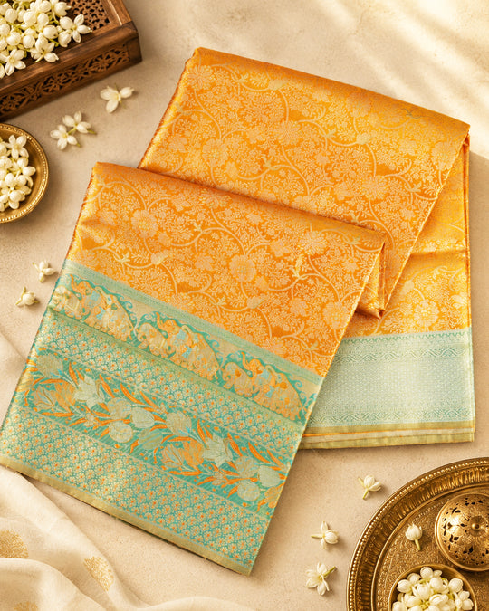 Saffron Pure Kanjivaram Saree with Floral Vine Jaal Weaves with Contrast Border