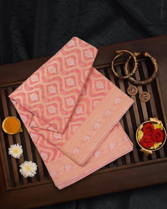 Peach Pure Sooti Cotton Saree with Intricate Floral Weaving