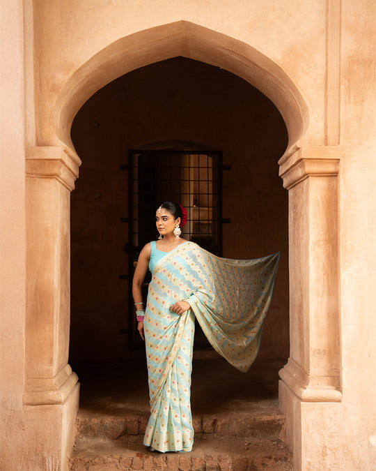 Aqua Blue Pure Chiffon Saree with Zig-Zag Weaves and Multi Floral Weaves