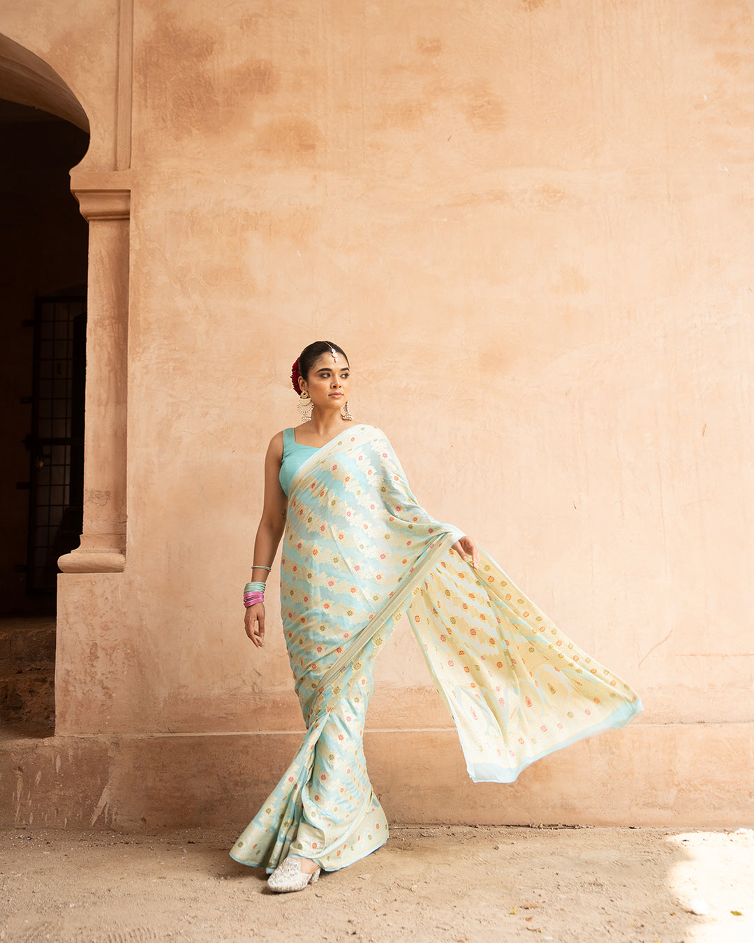 Aqua Blue Pure Chiffon Saree with Zig-Zag Weaves and Multi Floral Weaves