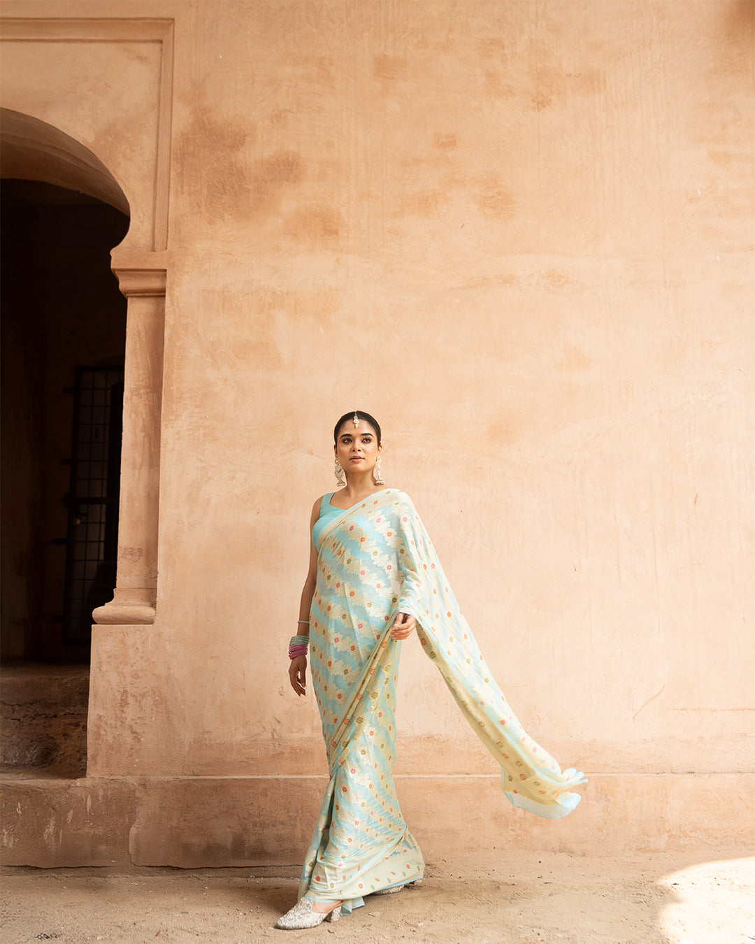 Aqua Blue Pure Chiffon Saree with Zig-Zag Weaves and Multi Floral Weaves