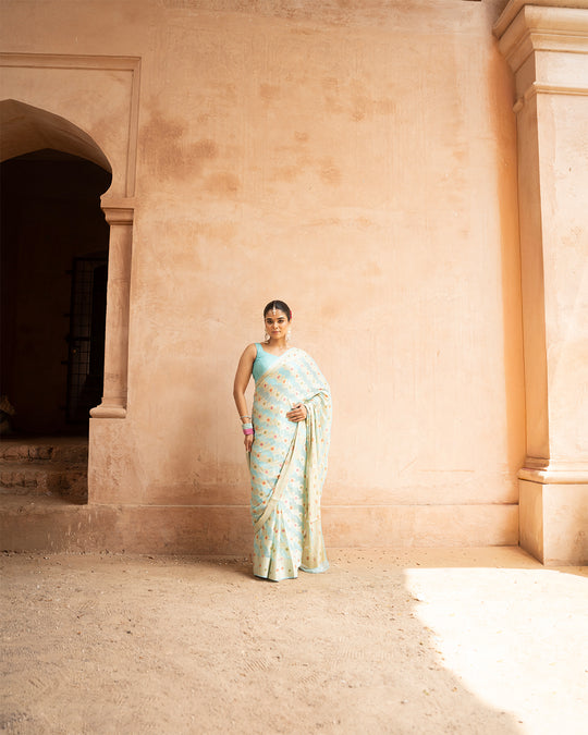 Aqua Blue Pure Chiffon Saree with Zig-Zag Weaves and Multi Floral Weaves