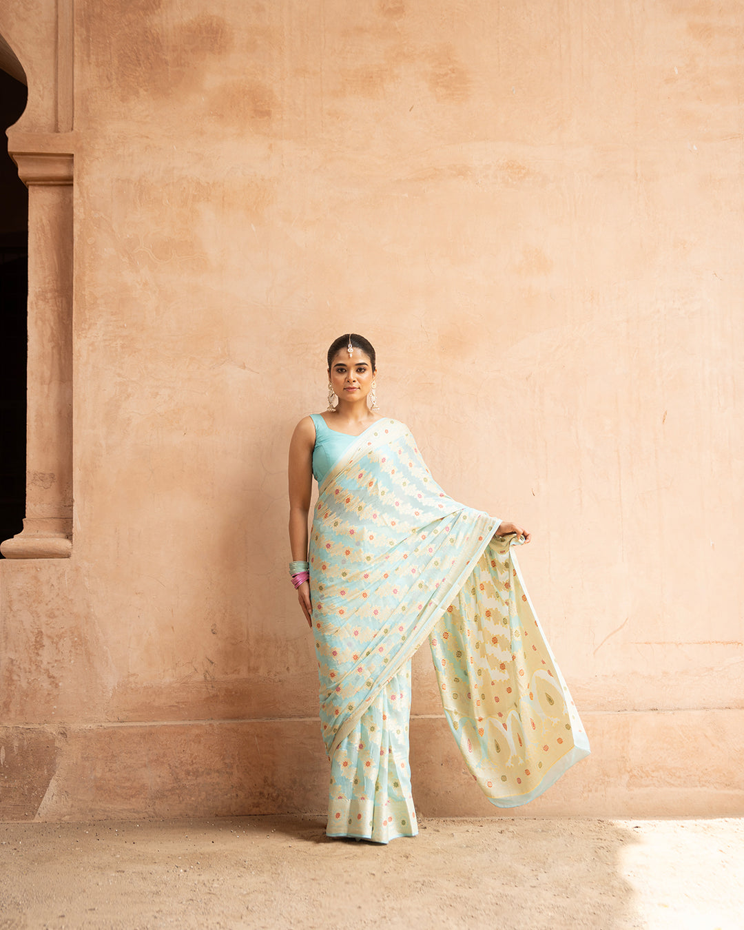 Aqua Blue Pure Chiffon Saree with Zig-Zag Weaves and Multi Floral Weaves