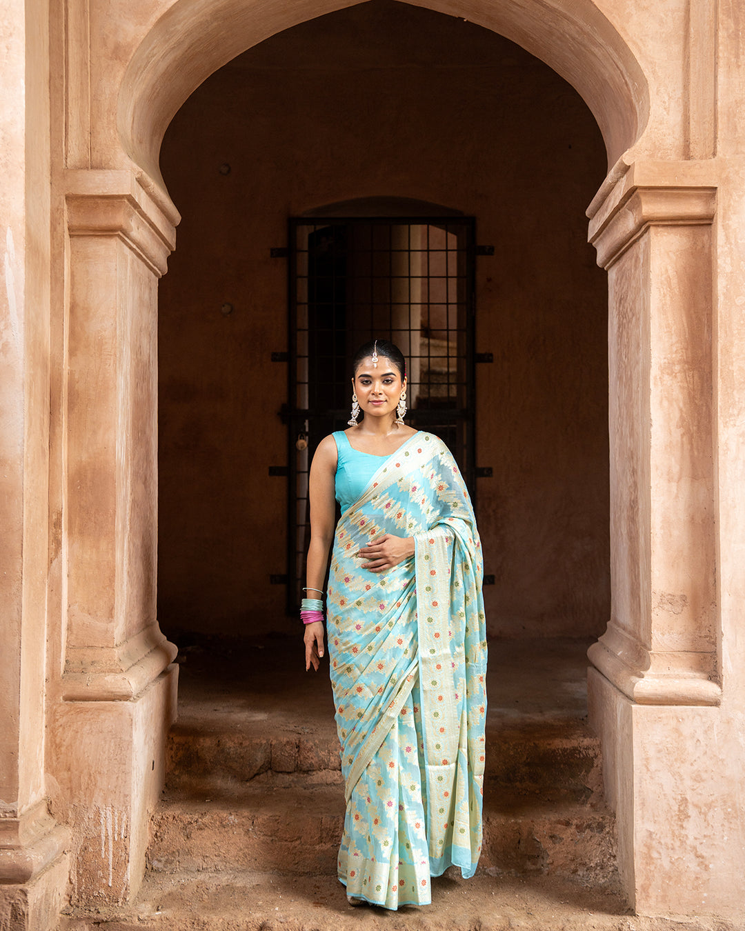 Aqua Blue Pure Chiffon Saree with Zig-Zag Weaves and Multi Floral Weaves