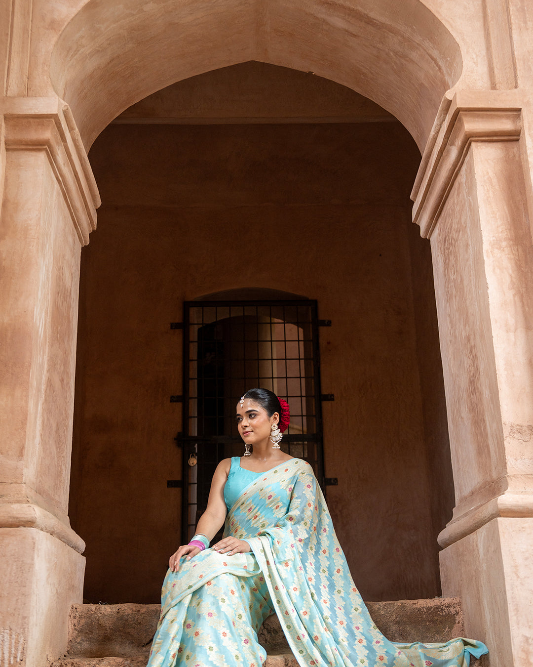 Aqua Blue Pure Chiffon Saree with Zig-Zag Weaves and Multi Floral Weaves