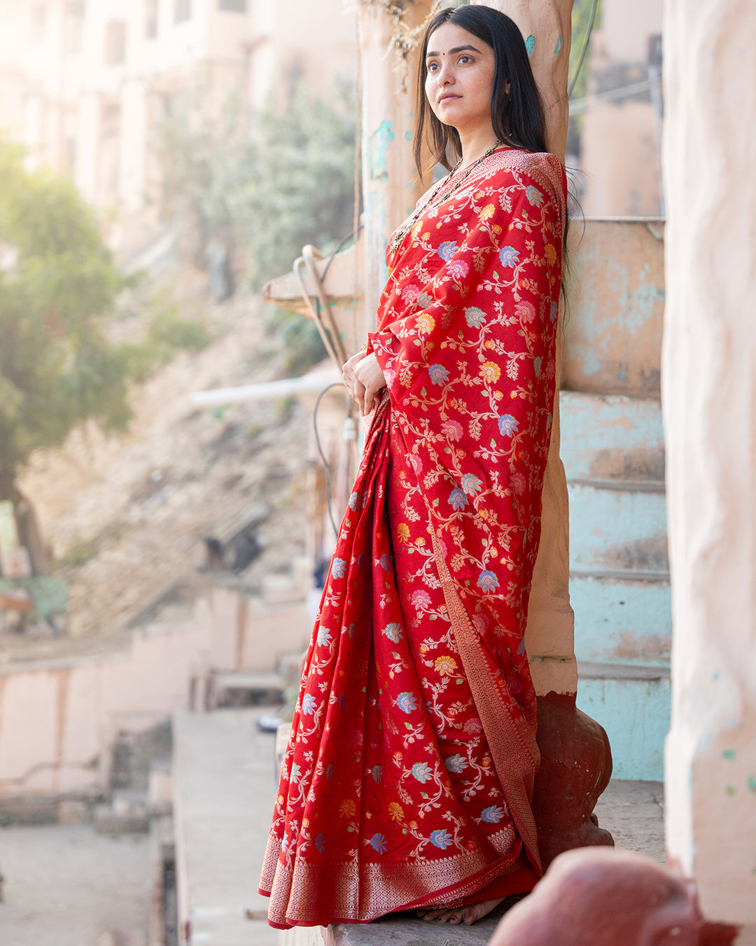 Radiant Red Banarasi Silk Saree with Opulent Real Zari Embellishments and Graceful Floral Motifs