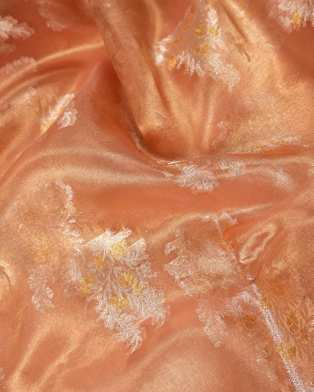 Coral Peach Pure Tissue Saree with Floral Golden Zari Accents