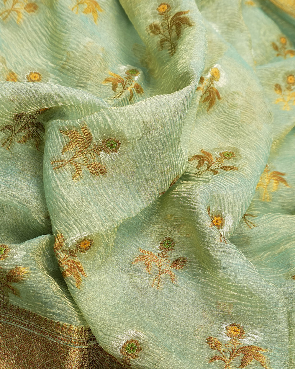 Soft Green Pure Tissue Saree with Blossom Motifs and Heritage Zari Border