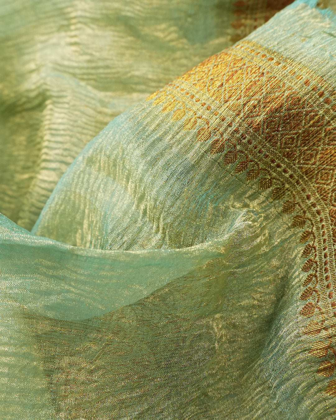 Soft Green Pure Tissue Saree with Blossom Motifs and Heritage Zari Border
