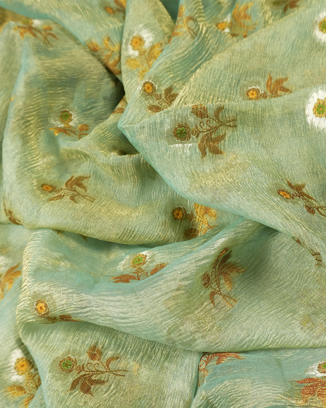 Soft Green Pure Tissue Saree with Blossom Motifs and Heritage Zari Border