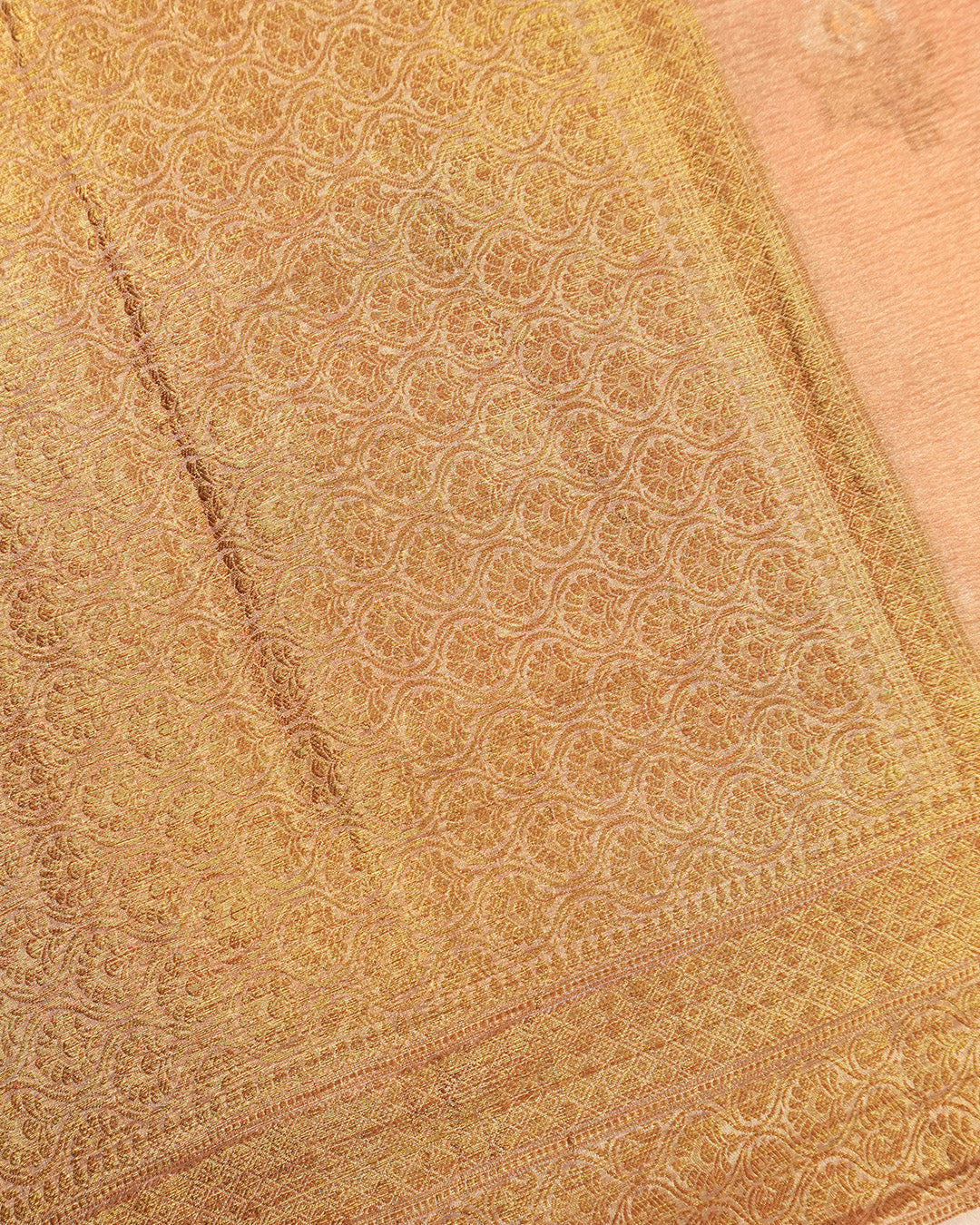 Soft Peach Pure Tissue Saree with Minimal Butis and Antique Zari Border