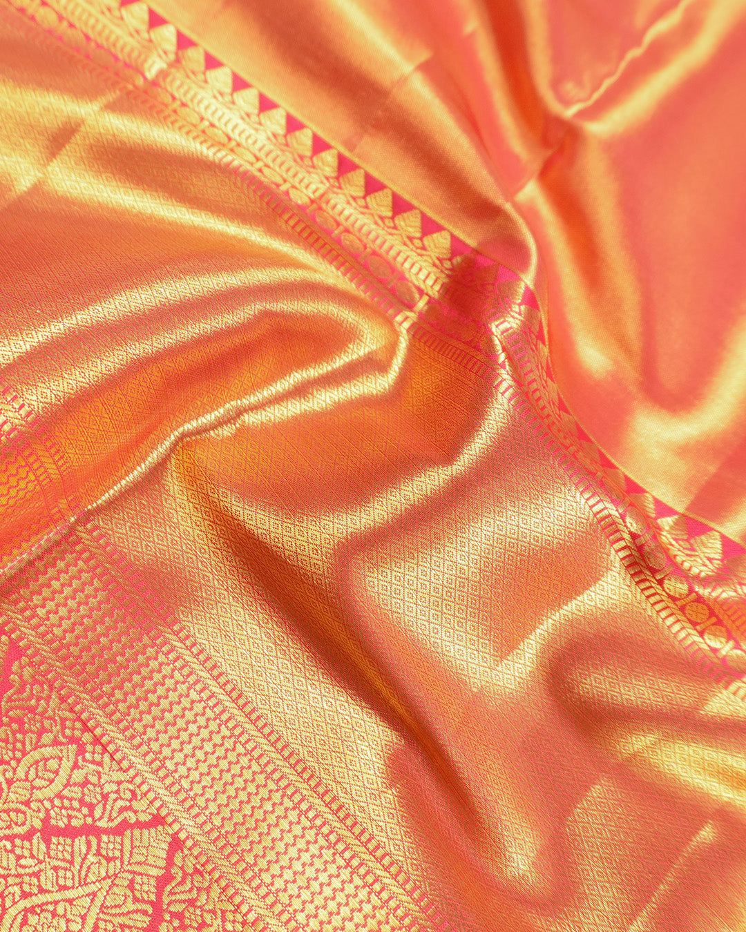 Peach Coral Pure Kanjivaram Saree with Floral Weaves