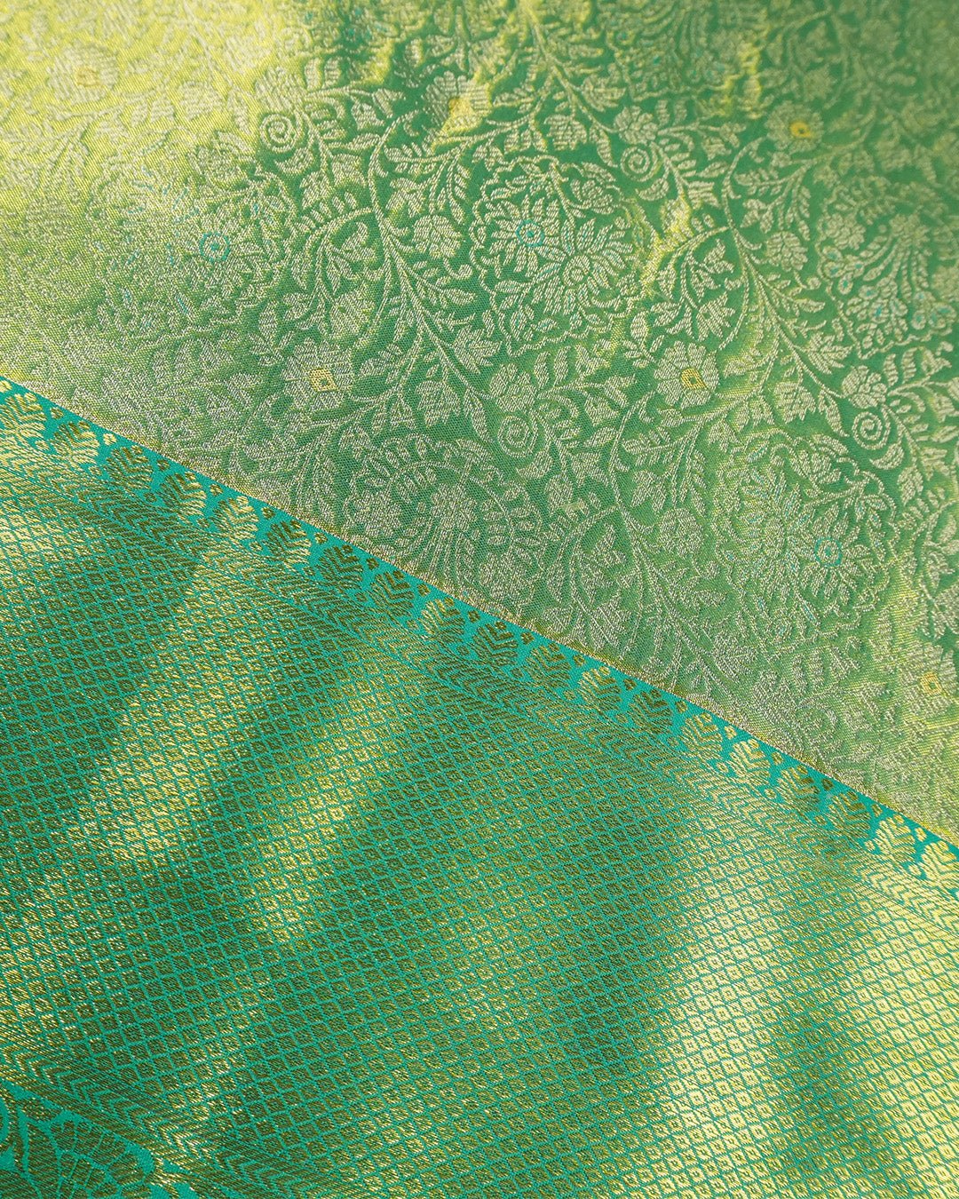 Green Pure Kanjivaram Saree With Teal Accents and Antique Gold Florals - katansi