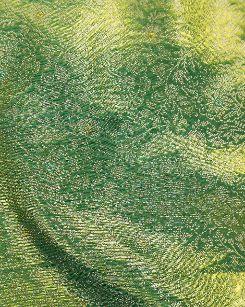 Green Pure Kanjivaram Saree With Teal Accents and Antique Gold Florals