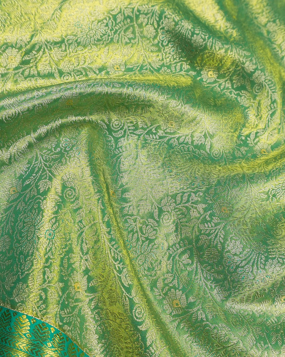 Green Pure Kanjivaram Saree With Teal Accents and Antique Gold Florals - katansi