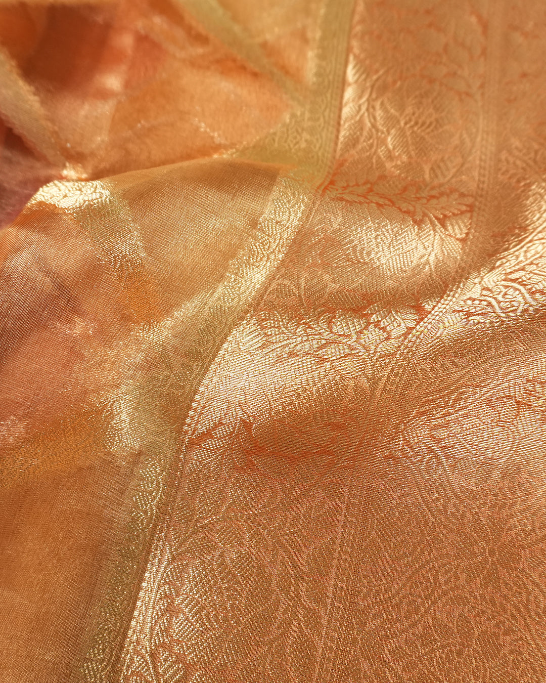 Sunlit Peach Pure Tissue Saree with Checkered Weave and Heritage Border
