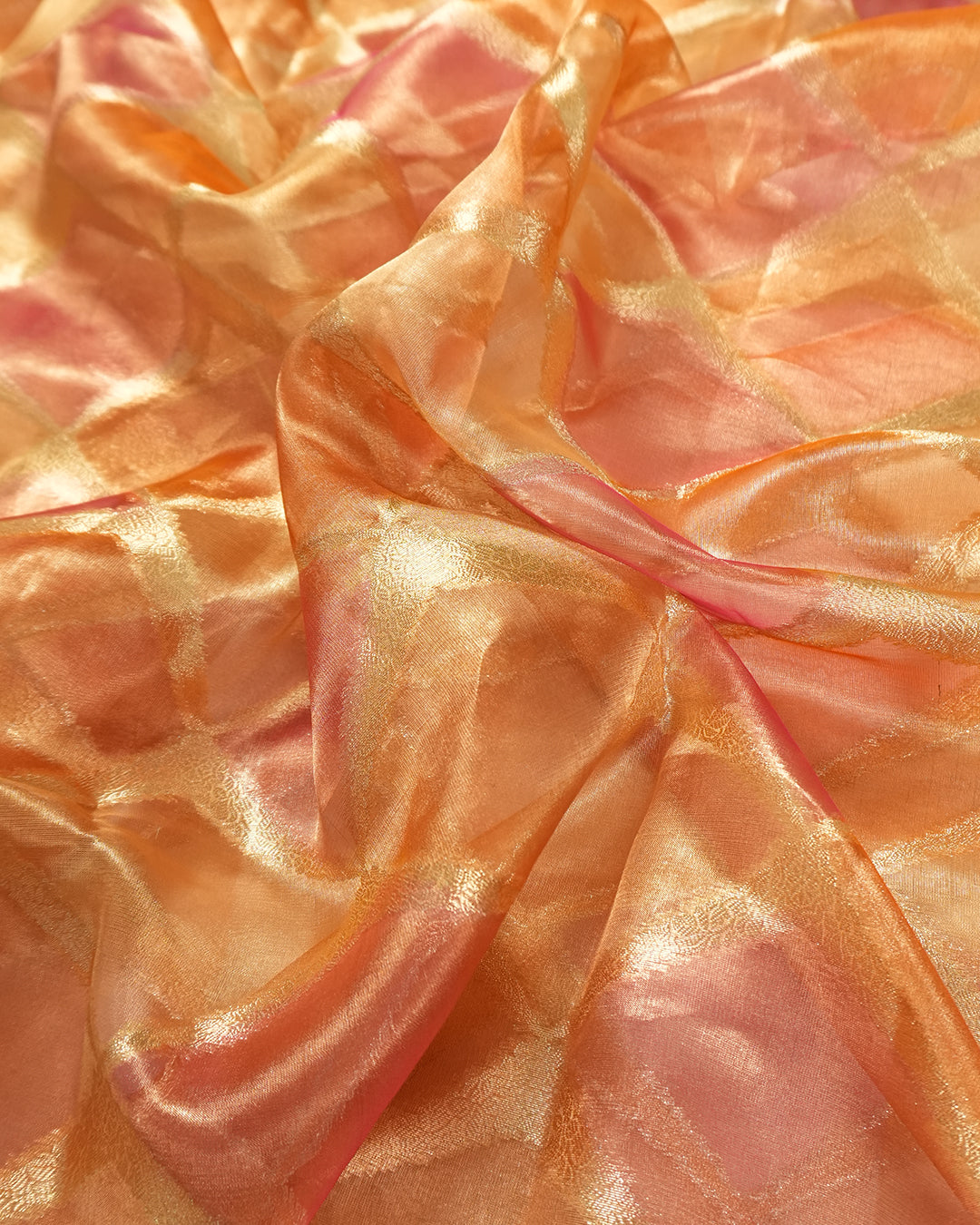 Sunlit Peach Pure Tissue Saree with Checkered Weave and Heritage Border