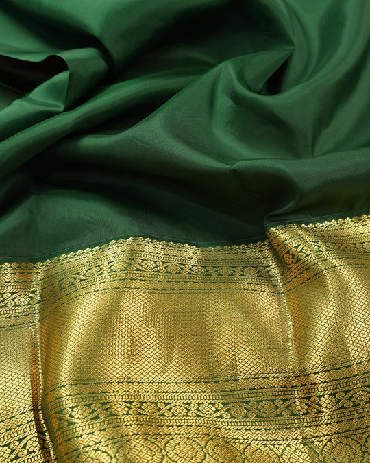 Red Kanjivaram Saree with Mandala Motifs and Contrasting Border