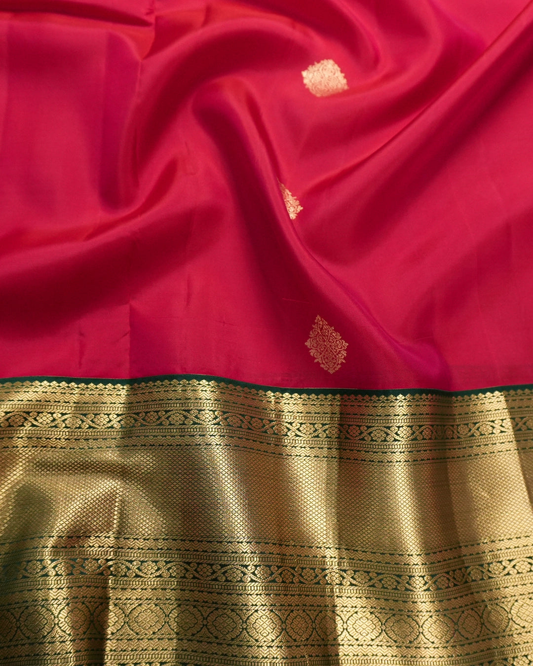 Red Kanjivaram Saree with Mandala Motifs and Contrasting Border