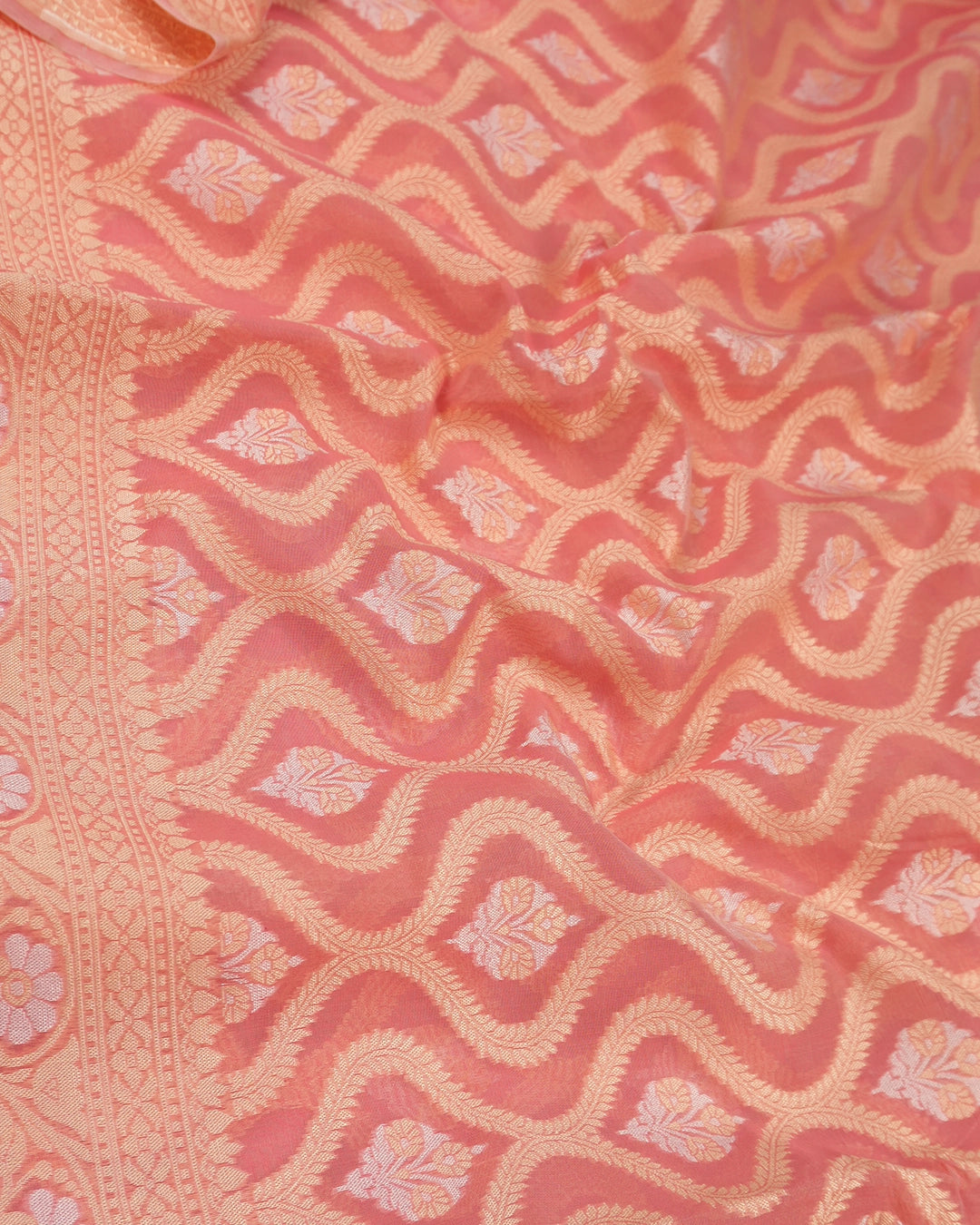 Peach Pure Sooti Cotton Saree with Intricate Floral Weaving